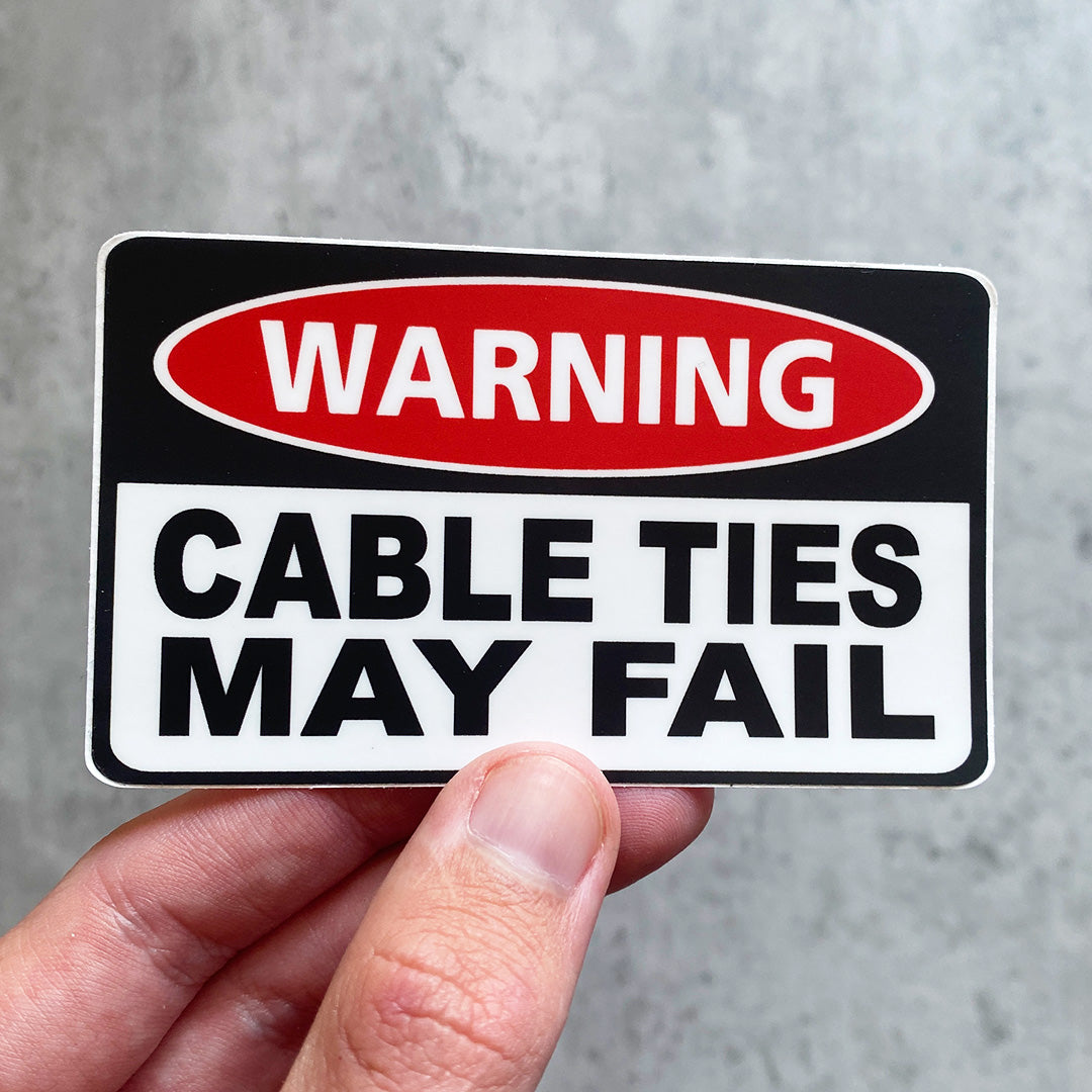 WARNING CABLE TIES MAY FAIL STICKER